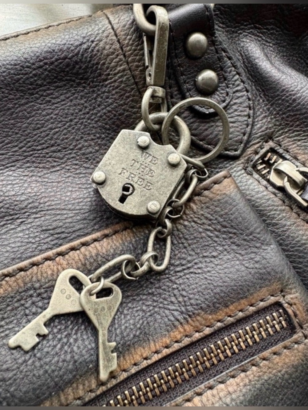 We the Free Lock Keychain 🔥